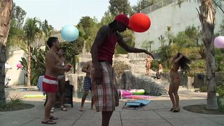 Busty Oriental slut gets long ebony dong fuck after playing by the pool